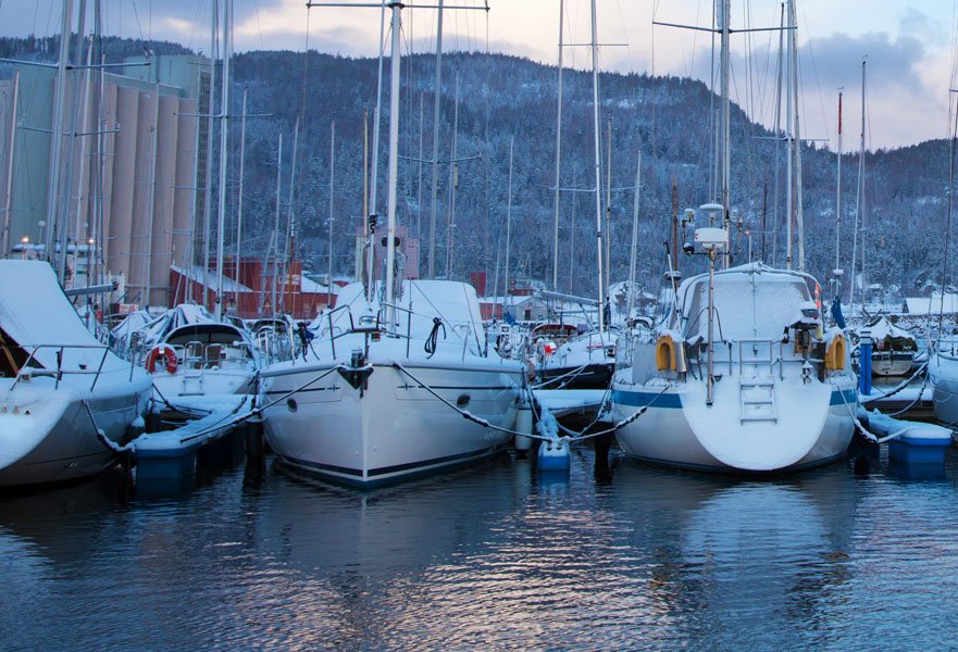 winter view docked yachts + boat winterization and pre-season - how to winterize your boat  