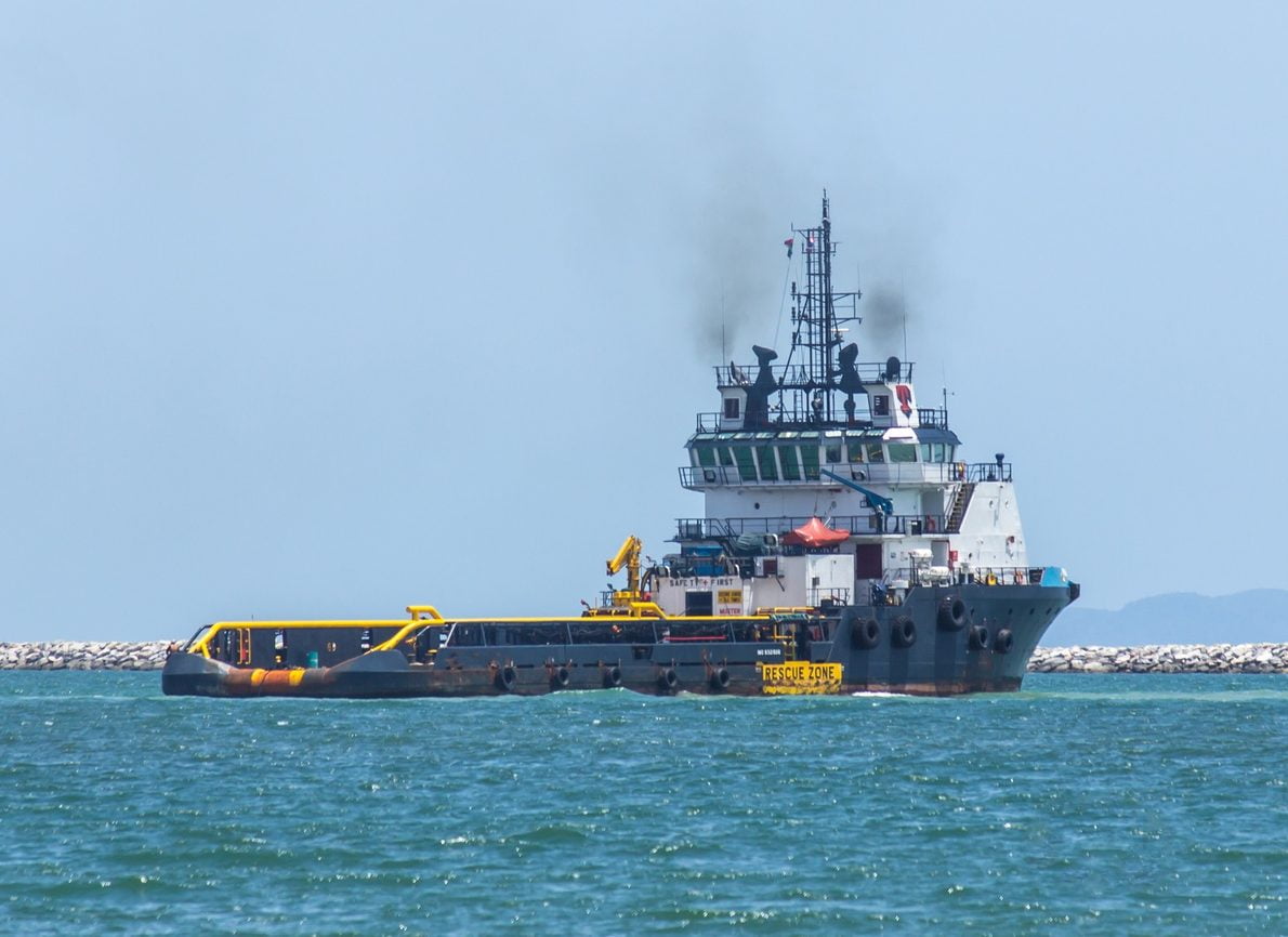 tugboat sailing on the sea for a commercial vessel services