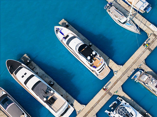 luxury yachts and sailboats docked