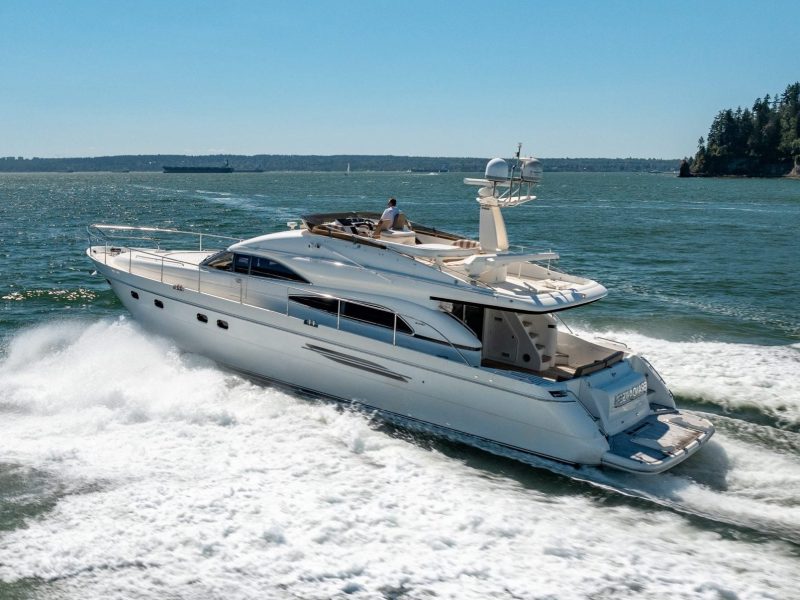 white 2000 viking princess 65' cruising on the sea