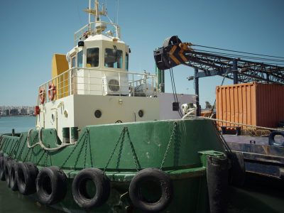 barge dredging platform crane barge tug boat on the sea